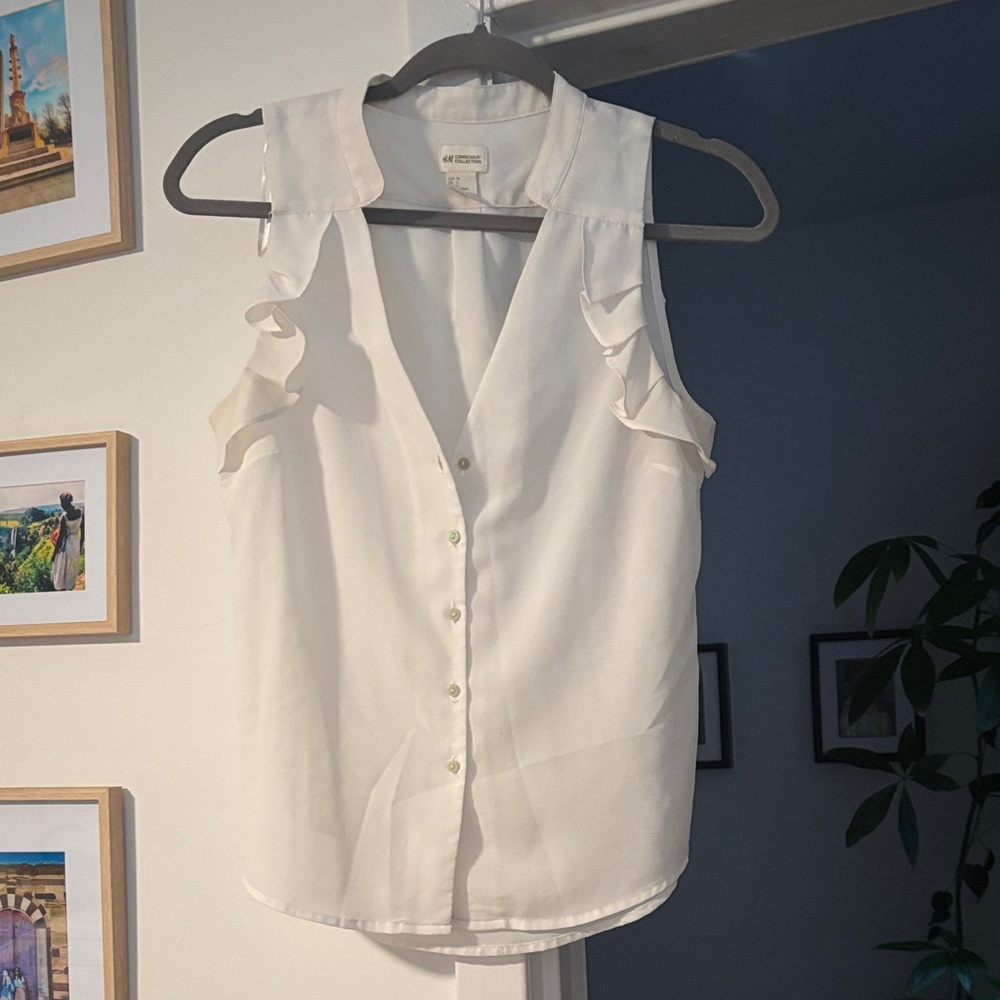 White Ruffle Sleeve Sleeveless Blouse